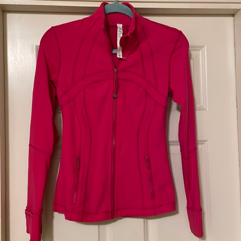 Never worn Women’s Lululemon athletic full zip jacket in pink size 4